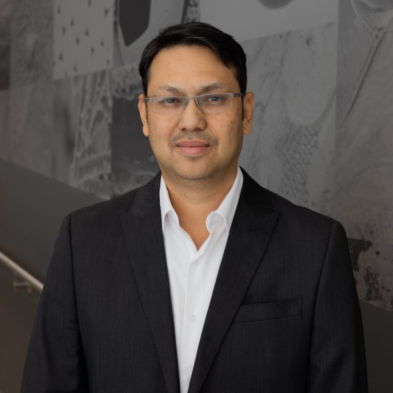 Rituraj Borgohain, Ph.D. Rituraj Borgohain, Ph.D. standing in the Kelly Hall lobby.